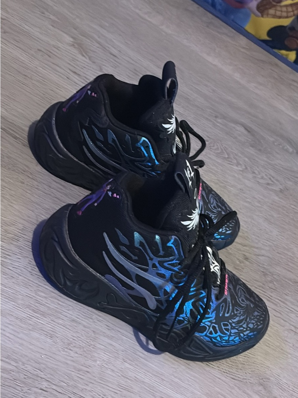 Puma Kids Black Sneakers with Iridescent Blue & Purple Accents